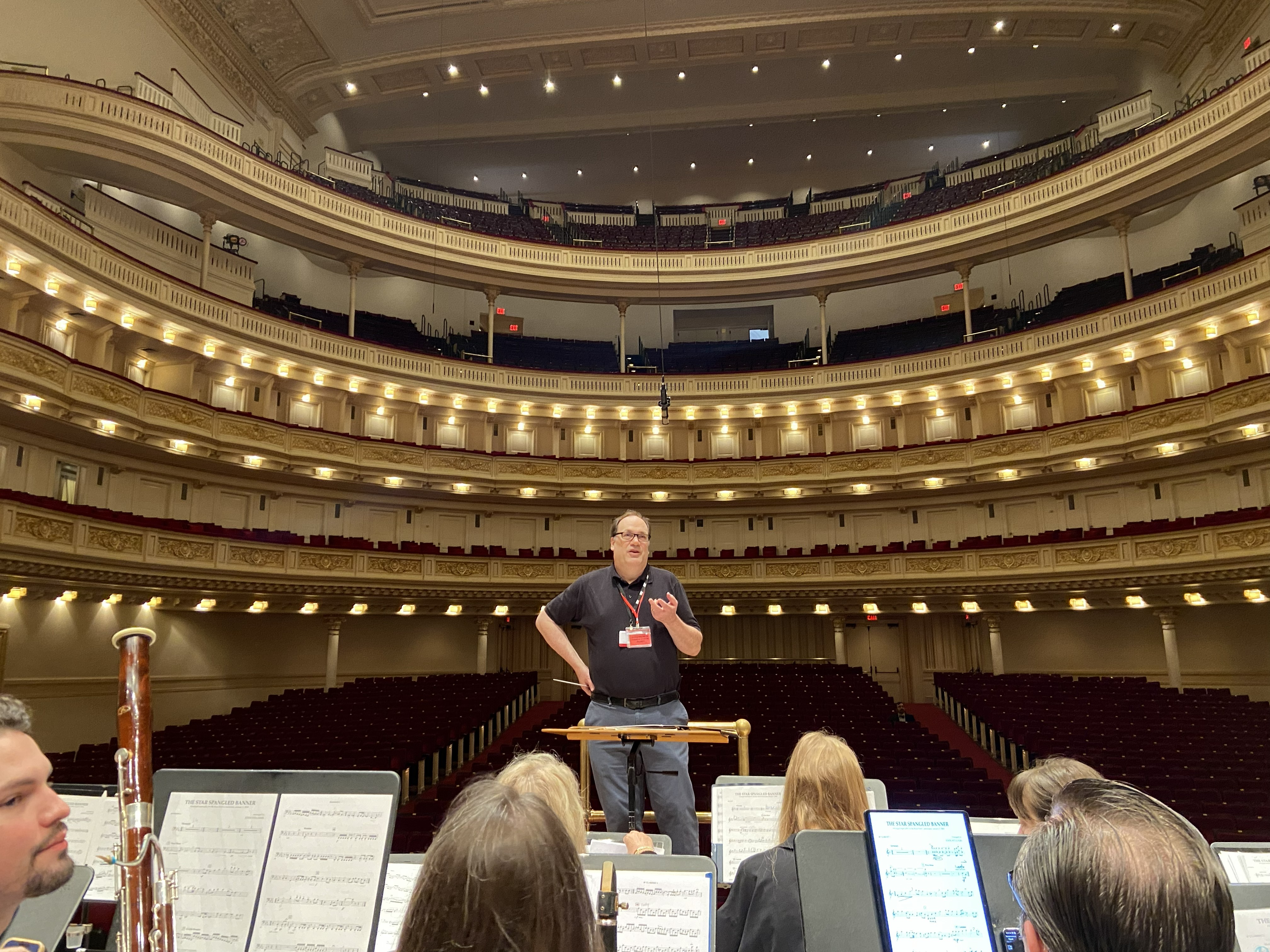 Photo from the stage inside Carnegie Hall of Michael Brewer, conductor of the Classic City Band. Taken by David Floyd July 28, 2026